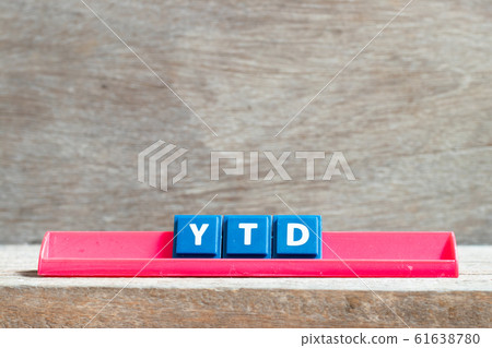 Tile letter on red rack in word YTD 61638780