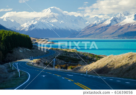 Snow covered Mount Cook with Lake Pukaki and road in the foreground from Peters Lookout, South Island, New Zealand Snow covered Mount Cook with Lake Pukaki and road in the foreground from Peters Lookout, South Island, New Zealand 61639056