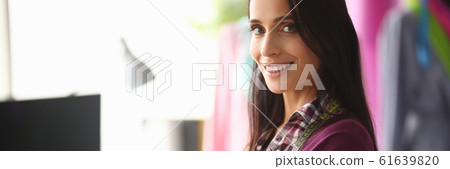 Beautiful tailor with scissors Beautiful tailor with scissors 61639820