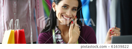 Joyful busy tailor 61639822