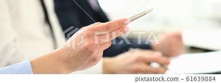 Gorgeous woman with pen 61639884