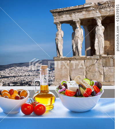 Famous Acropolis with Greek salad in Athens, Greece 61639931