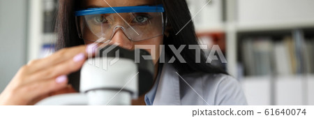 Beautiful mature assistance using scientific microscope 61640074