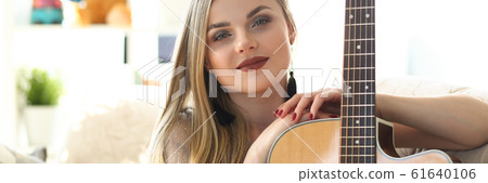 Female Guitar Player Musical Performer Portrait Female Guitar Player Musical Performer Portrait 61640106