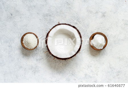 Coconut oil and flour in bowls Coconut oil and flour in bowls 61640877
