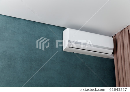 Air conditioner on green wall, shallow dept of Air conditioner on green wall, shallow dept of 61643237