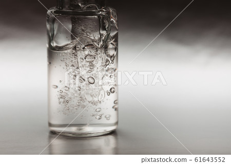 Macro photo of bottle with collagen Macro photo of bottle with collagen 61643552