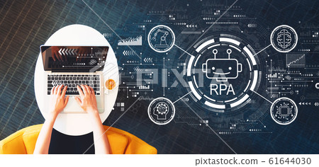 Robotic process automation concept with person using a laptop 61644030