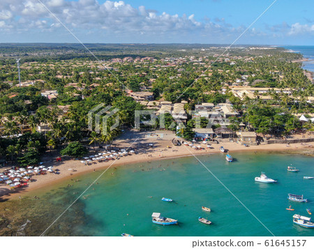 Aerial view of Praia Do Forte coastline village with beach and blue clear sea water 61645157