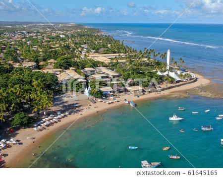 Aerial view of Praia Do Forte coastline village with beach and blue clear sea water 61645165