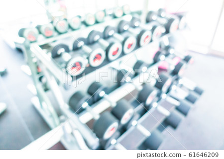 Abstract blur gym room interior with fitness equipment Abstract blur gym room interior with fitness equipment 61646209