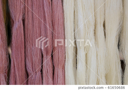 White and brown dying lines of fabric pipes. 61650686