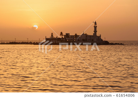 Haji Ali Dargah mosque and tomb on sunset. Mumbai. Haji Ali Dargah mosque and tomb on sunset. Mumbai. 61654806