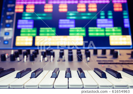 music synthesizer and waveform on computer monitor music synthesizer and waveform on computer monitor 61654963