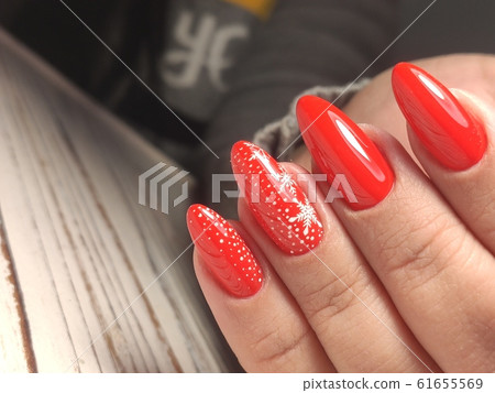 Beautiful woman's nails with beautiful christmas Beautiful woman's nails with beautiful christmas 61655569