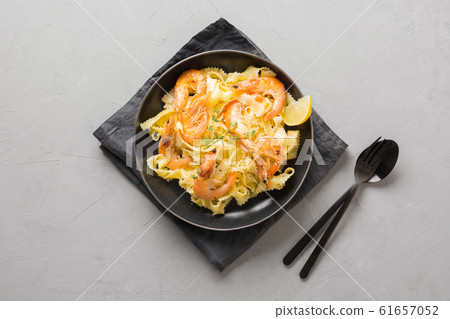 Pasta reginette with seafood, shrimps, mussels Pasta reginette with seafood, shrimps, mussels 61657052