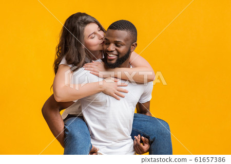 Interracial Couple In Love Having Romantic Moments Together 61657386