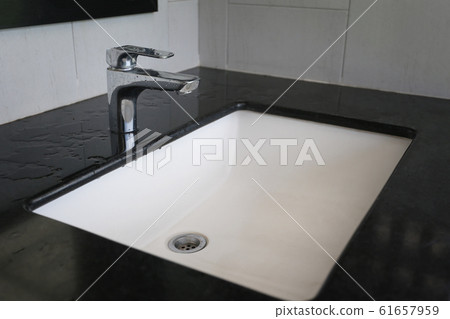 Faucet and Sinks after going through use. 61657959