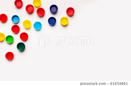 Colored frame plastic covers from bottles isolated on white Colored frame plastic covers from bottles isolated on white 61658661