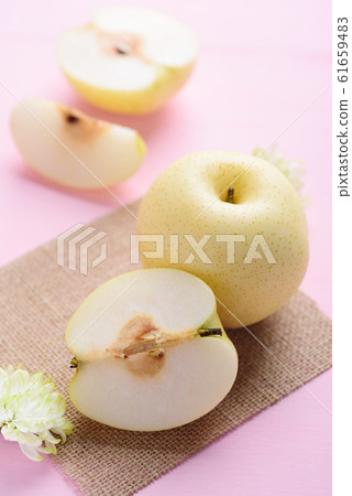 Fresh Asian pear fruit on pink background Fresh Asian pear fruit on pink background 61659483