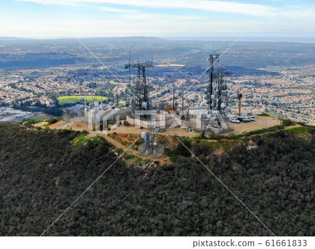 Aerial view of telecommunication antennas on the top of Mountain 61661833