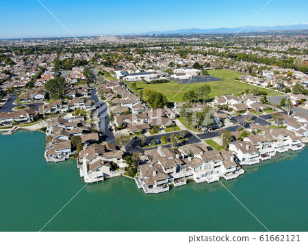Aerial view of North Lake surrounded by residential neighborhood  Aerial view of North Lake surrounded by residential neighborhood  61662121