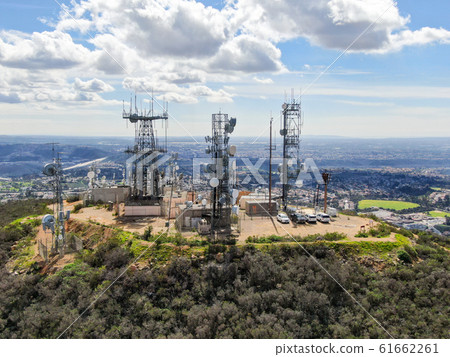 Aerial view of telecommunication antennas on the top of Mountain 61662261