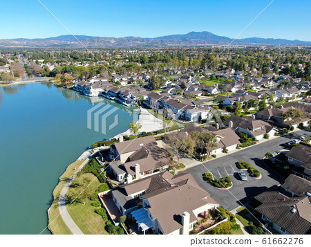 Aerial view of North Lake surrounded by residential neighborhood  61662276