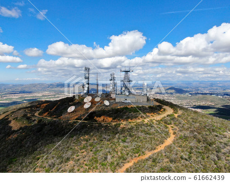 Aerial view of telecommunication antennas on the top of Mountain 61662439