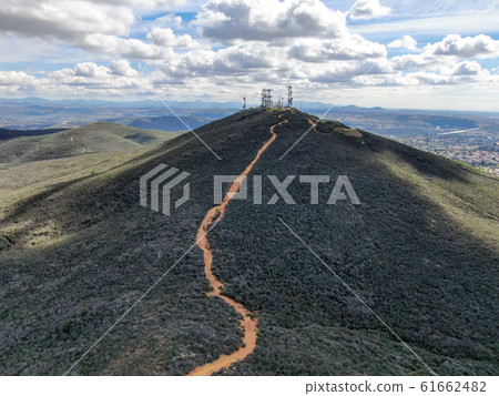 Aerial view of telecommunication antennas on the top of Mountain Aerial view of telecommunication antennas on the top of Mountain 61662482
