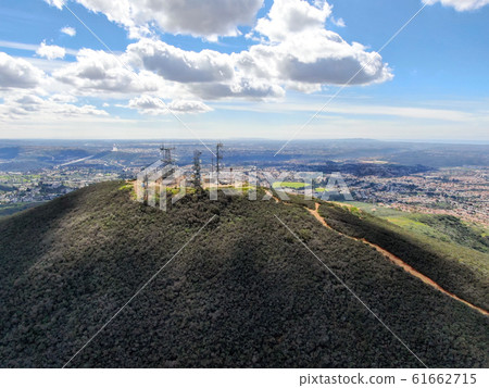 Aerial view of telecommunication antennas on the top of Mountain Aerial view of telecommunication antennas on the top of Mountain 61662715