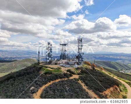 Aerial view of telecommunication antennas on the top of Mountain Aerial view of telecommunication antennas on the top of Mountain 61662935