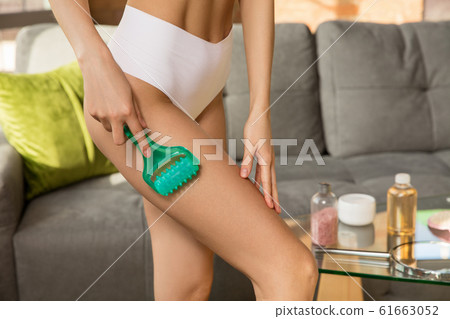 Beauty Day. Woman doing her daily skincare routine at home Beauty Day. Woman doing her daily skincare routine at home 61663052