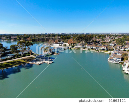 Aerial view of North Lake surrounded by residential neighborhood  Aerial view of North Lake surrounded by residential neighborhood  61663121