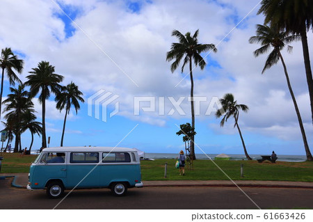 Classic car and palm trees 61663426