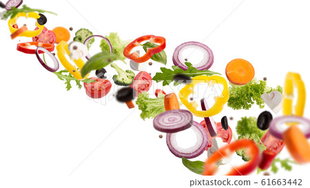 Fresh salad with flying vegetables ingredients isolated on whit Fresh salad with flying vegetables ingredients isolated on whit 61663442