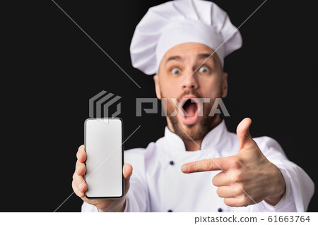 Chef Showing Phone Screen Recommending Application On Black Background, Mockup 61663764