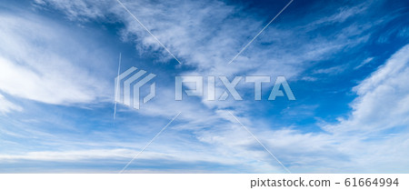 Blue sky background with clouds 61664994
