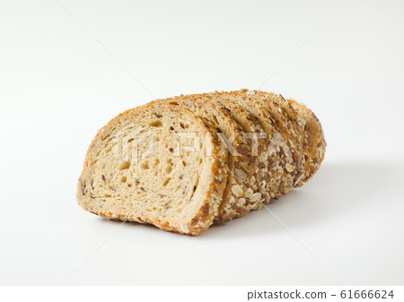 Sliced loaf of whole grain bread 61666624