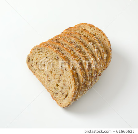 Sliced loaf of whole grain bread 61666625