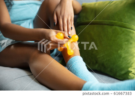 Beauty Day. Woman doing her daily skincare routine at home Beauty Day. Woman doing her daily skincare routine at home 61667383