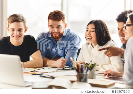 Team of college students talking over group project Team of college students talking over group project 61667993