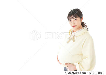 Young pregnant woman in plain clothes Young pregnant woman in plain clothes 61668809