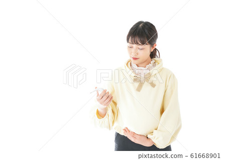 Young pregnant woman taking a temperature measurement Young pregnant woman taking a temperature measurement 61668901