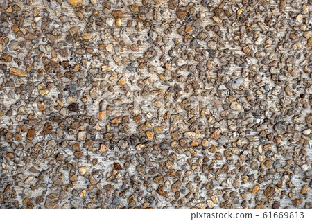 Pattern of gravel at the floor of walkway in Wat Phra That Doi Phra Chan in Mae Tha District 61669813