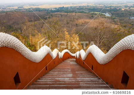 Aerial view at the gate of Wat Phra That Doi Phra Chan on the top of a mountain in Mae Tha District 61669816