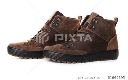 Pair of brown male boots isolated over white background Pair of brown male boots isolated over white background 61669895