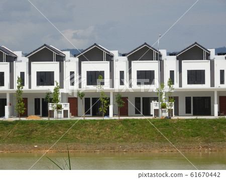 New double story luxury terrace house under construction in Malaysia.  Designed by an architect with a modern and contemporary style.  61670442