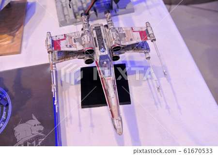 Model of X-Wing starfighter plane from Star Wars franchise movies. Displayed to public by the collector. 61670533