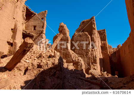 Mud brick house ruins in the desert, Tinghir, Morocco 61670614